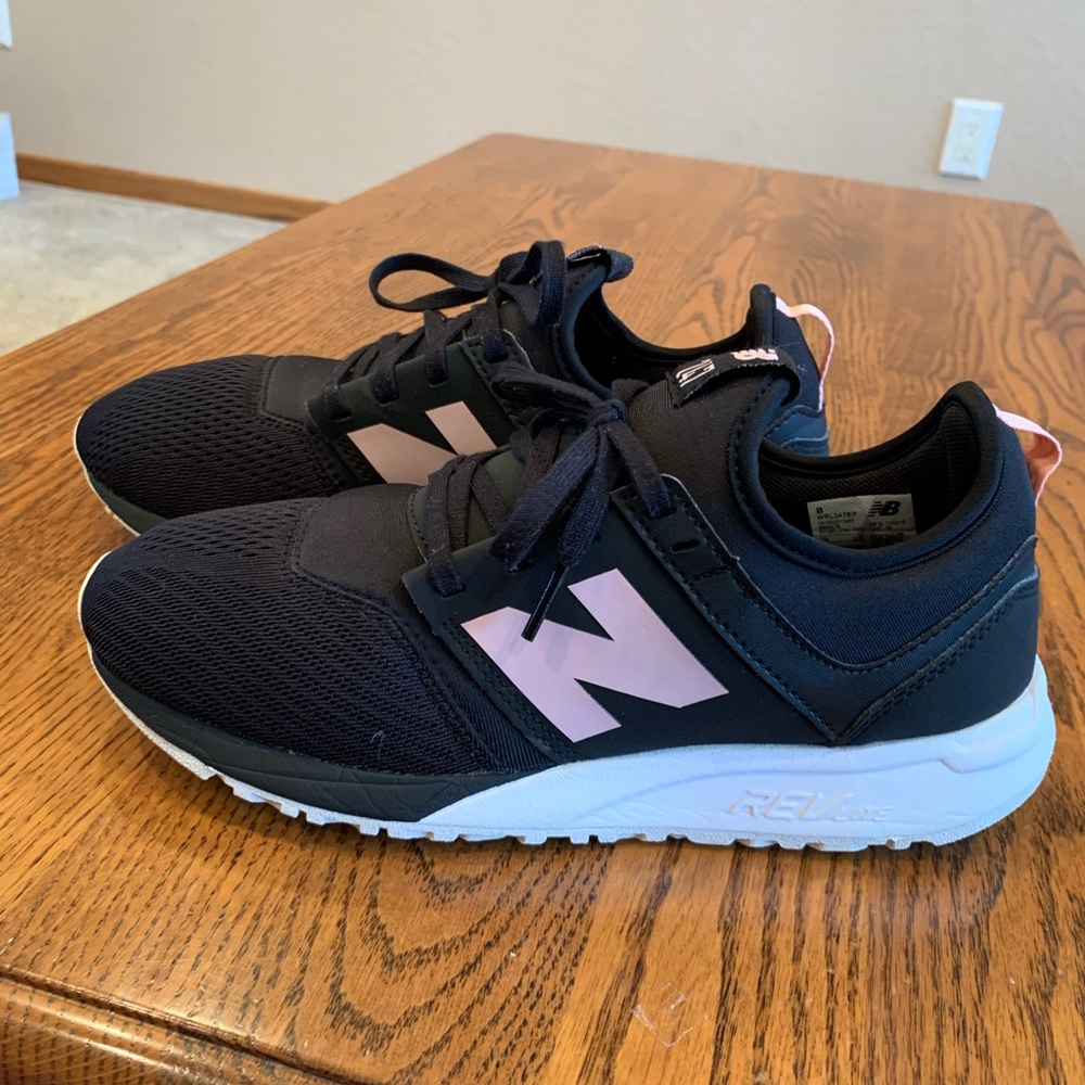 New Balance black shoes.
